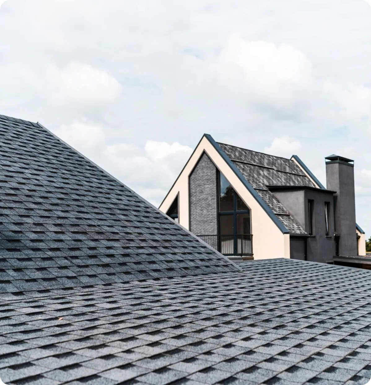 selective-focus-of-building-with-windows-near-rooftop-e1625561337841 1